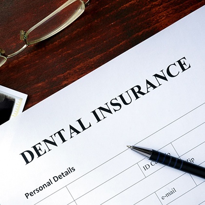 dental insurance form on table 