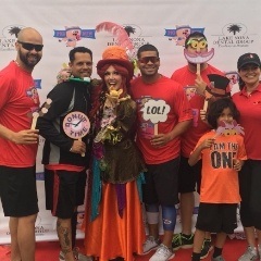 Group of team members in costumes at an event