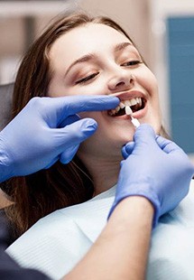 Woman receiving a cosmetic dentistry consultation