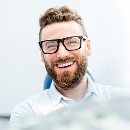 patient talking to dentist about cost of full mouth reconstruction