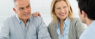 Man and woman discussing options for sleep apnea therapy