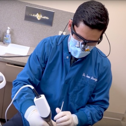 Dentist treating dental patient