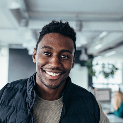 man smiling with veneers in Lake Nona 