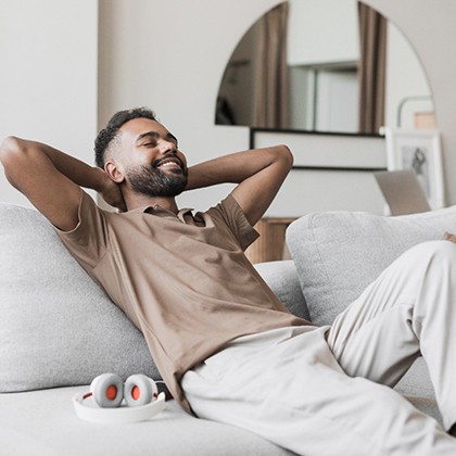 a person resting on a couch